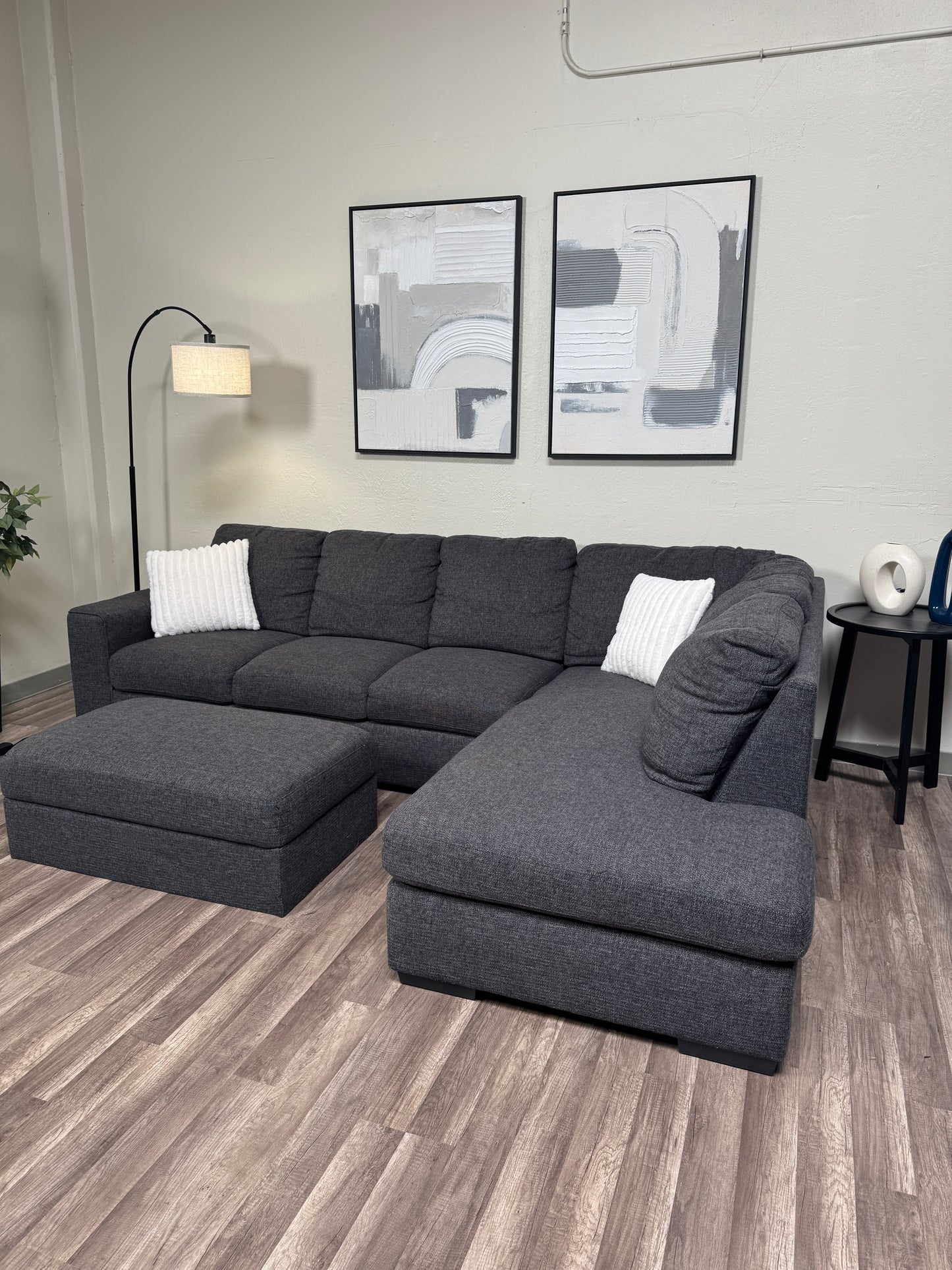 Living Spaces Dark Gray Sectional with Ottoman