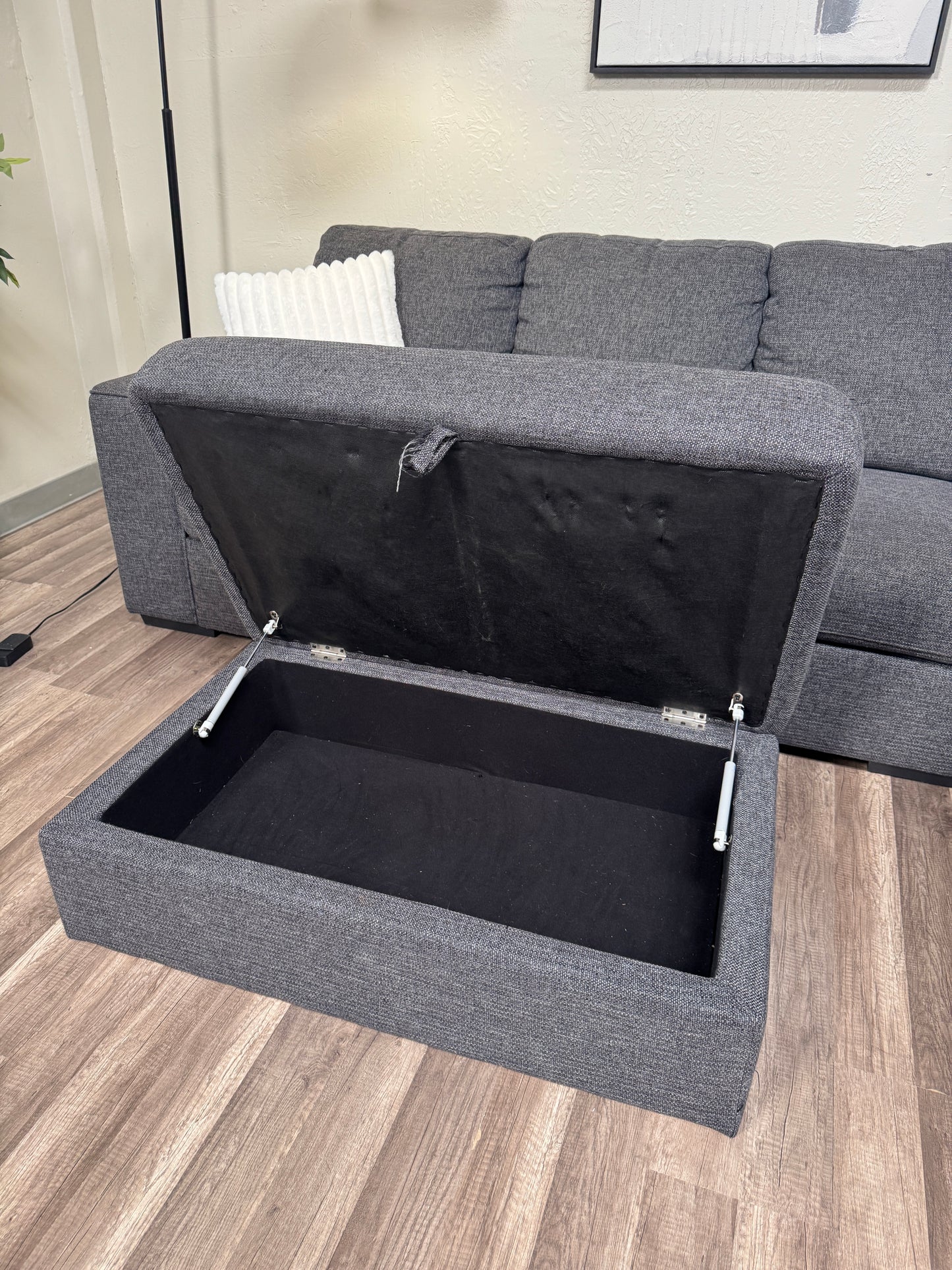 Living Spaces Dark Gray Sectional with Ottoman