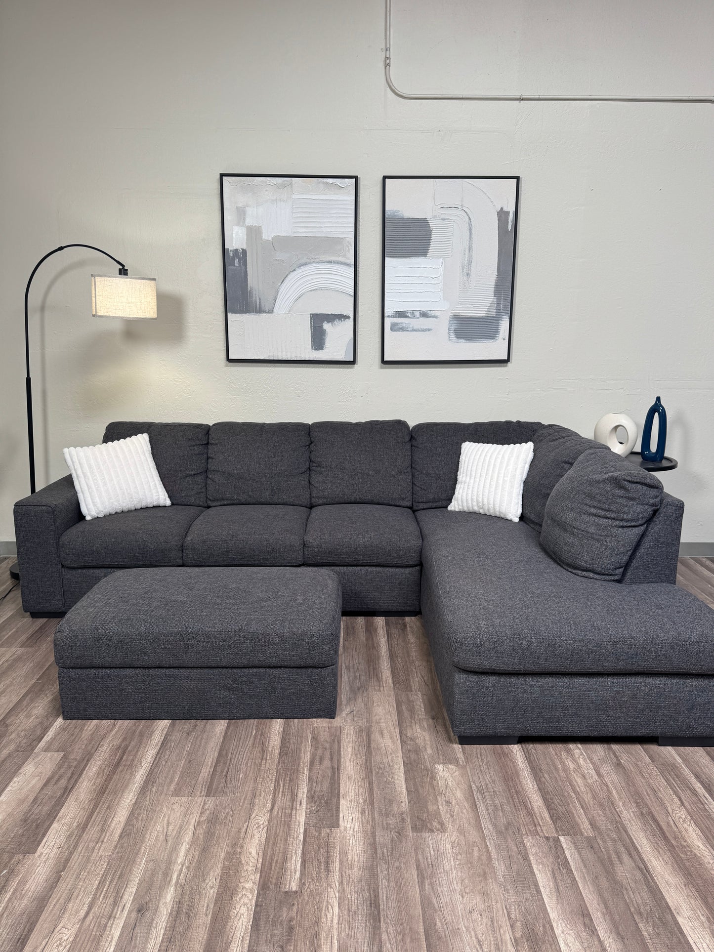 Living Spaces Dark Gray Sectional with Ottoman